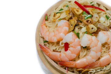 noodles with vegetables and prawn in wooden bowl