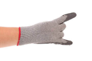 Hand shows rock sign in rubber glove.