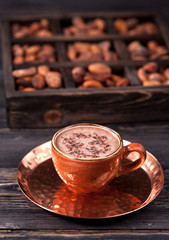 cup cocoa and cocoa beans