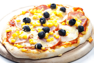 pizza with ham, corn and olives