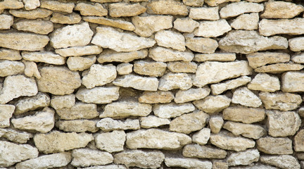 background texture of stones in the fence