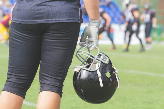 American football player waiting to join the game.