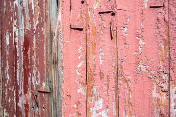 chipped paint on the wall of the old boards