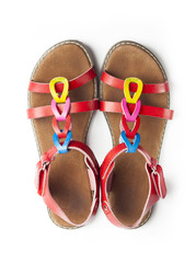 Top view on pair of colorful female sandals