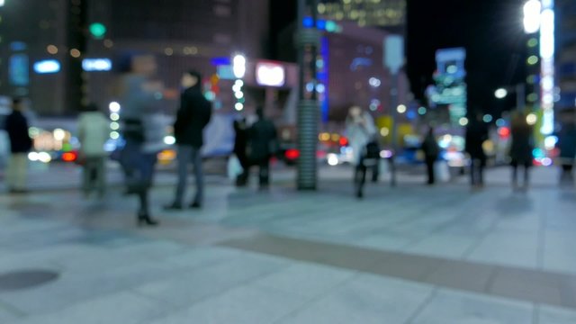 Anonymous crowd of people walking in Sukiyabashi crossing,Tokyo.