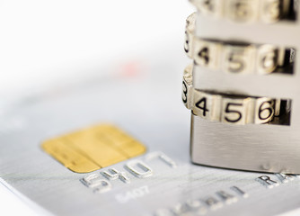 Close up of credit cards with padlock. Credit card security conc