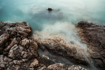Close-up photo of the sea and rocks