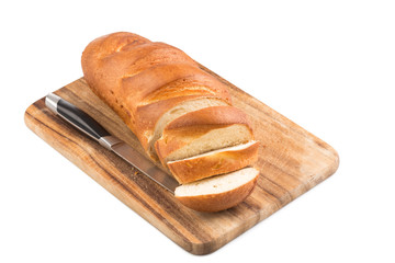 Sliced bread on a wooden chopping board