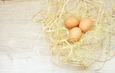 Eggs on the wooden background