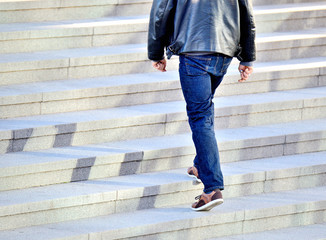 Man walking up the stairs