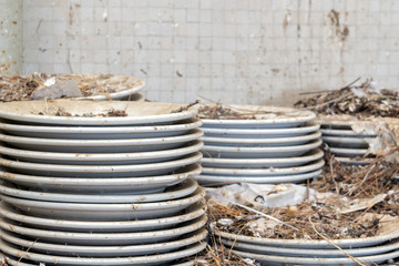 Stack of dishes, very dirty