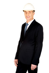 Smiling businessman with hard hat