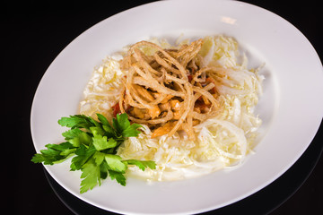 Chinese cabbage and onion salad close up