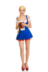 Beautiful bavarian woman with beer.