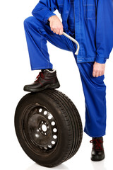 Repairman leg on a tire