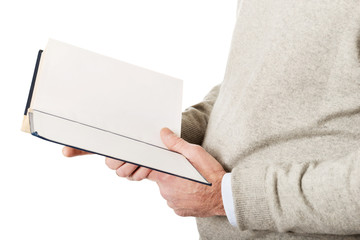 Male hands holding a book