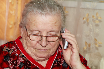Elderly woman and mobile phone