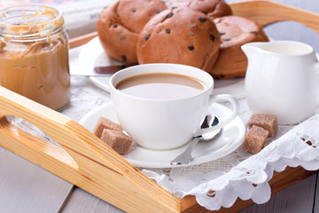 Breakfast with coffee, pastry and peanut butter