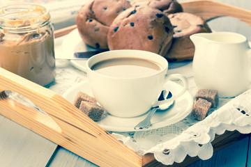 Breakfast with coffee, pastry and peanut butter