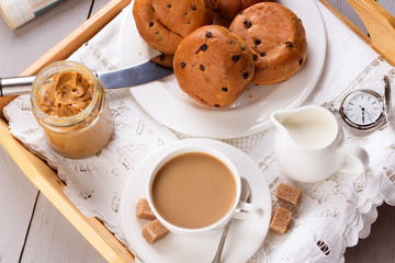 Breakfast with coffee, pastry and peanut butter