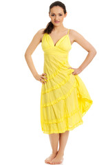 Beautiful female model in yellow dress.