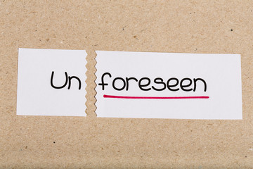 Sign with word unforeseen turned into foreseen