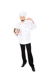 Chef in white uniform tasting his soup