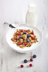 Granola with fruits in the bowl.