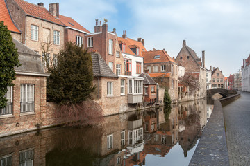Fototapeta na wymiar houses along the canals of Brugge, Belgium. Tourism destination