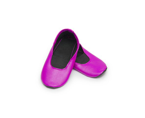 Childrens gym shoes isolated against a white background