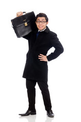 Obraz na płótnie Canvas Young man holding suitcase isolated on white