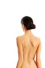 Back view of slim topless woman