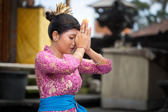 Balinese girl praying