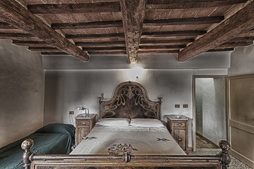 Bedroom with rustic wooden bed