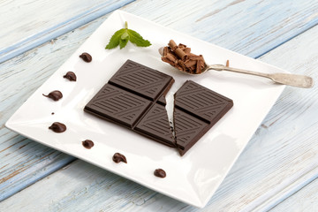 Dark chocolate on white plate