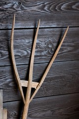 Ancient wooden pitchfork close-up