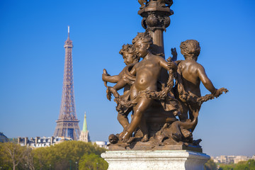 Fototapeta na wymiar Alexandre III bridge in Paris against Eiffel Tower, France