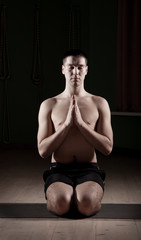 man doing yoga in the gym 2