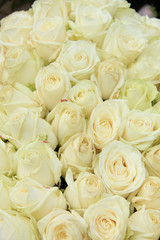 White roses in a wedding arrangement