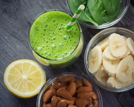Green fresh healthy smoothie with fruits and vegetables