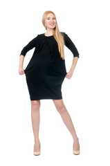 Fototapeta premium Pretty pregnant woman in mini black dress isolated on white