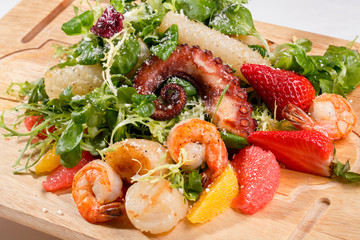 Seafood salad with octopus and shrimps