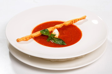 Tomato soup gazpacho with grissini