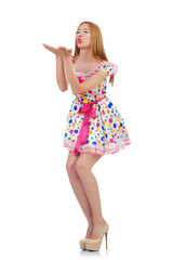 Woman in polka-dot dress isolated on white