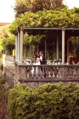 Bridal couple on vintage terrace