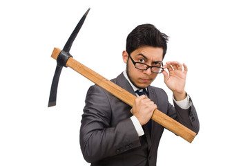 Young businessman holding a tool isolated on white