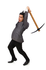 Young businessman holding a tool isolated on white