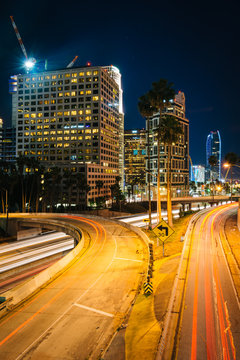 Traffic on the 110 Freeway and buildings in Los Angeles at night