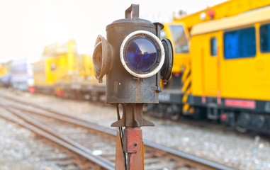 Traffic light shows blue signal on railway