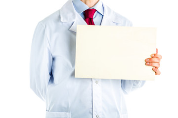 Doctor in white coat showing a yellow signboard